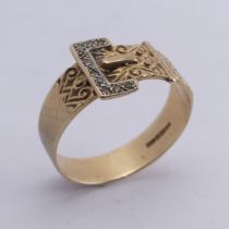 A 9ct yellow gold Buckle Ring, set small diamond points, Size Y, 4.3g.