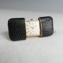 A Pontifa travelling Purse Watch, the silvered dial with gilt baton markers, 17-jewels movement,