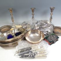 A quantity of Silver Plate, including a pair of candlesticks, entree dishes, bottle coaster,
