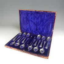 A cased set of twelve late Victorian silver Teaspoons with Sugar Nips, by James Dixon & Sons Ltd.,