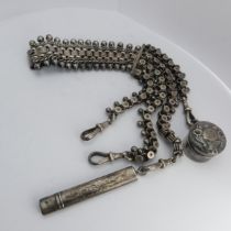 A Victorian silver Chatelaine, in the Aesthetic movement style, with four chains all with clip ends,