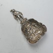 An Edwardian silver Caddy Spoon, by James Dudley, hallmarked London, 1906, the bowl with figural