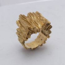 A 14ct yellow gold Ring, with textured bark design, Size M½, 11.8g.