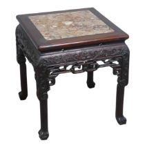 A small Chinese carved hardwood and pink marble Plant Stand, circa 1900, moulded top above foliate