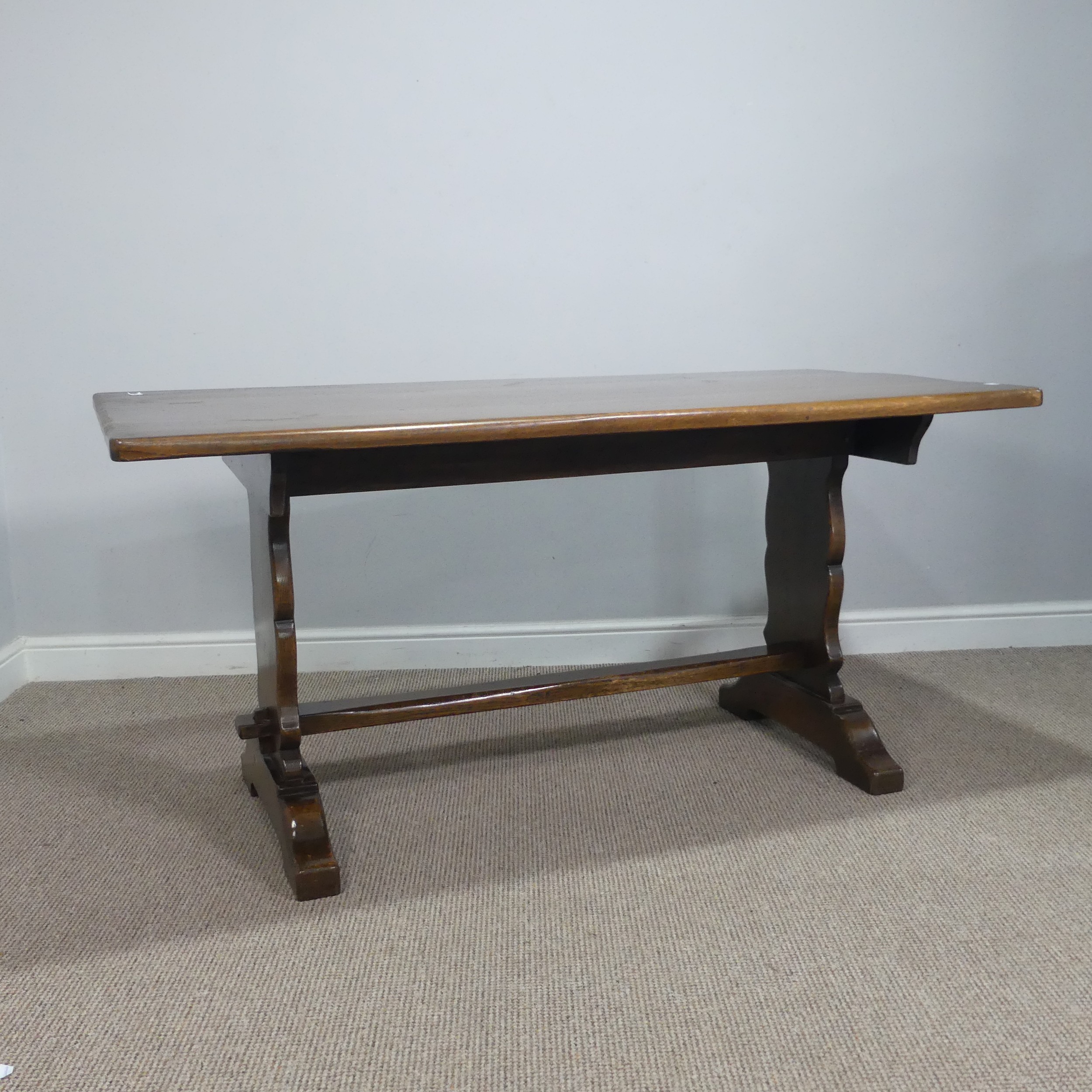 A craftsman style oak refectory dining Table, retailed by 'Shepherd & Hedger, Southampton', label
