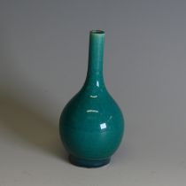 An antique Chinese turqouise monochrome bottle Vase, with bulbous base and slender neck, H 12.5cm.