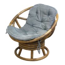 A mid-20th century bentwood bamboo swivel Chair, with blue cushion, W 74.5 cm x H 71 cm x D 65 cm