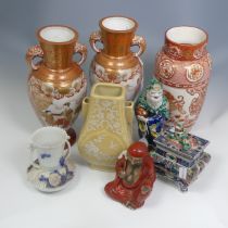 A quantity of decorative Japanese and Chinese Ceramics, to comprise three Kutani Vases, a pair of