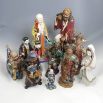 A quantity of 20thC and earlier Chinese pottery and porcelain Figures, comprising a large well