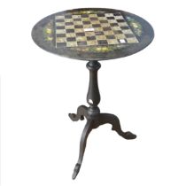A Victorian Chess Table, the painted slate tilt-top on turned column to three splayed legs, top