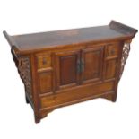 A Chinese stained softwood altar Table, scrolled top above two cupboard doors flanked by small