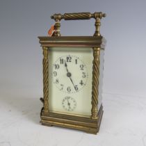 An early 20th century gilt-brass French Carriage Clock, with lever escapement and alarm, movement