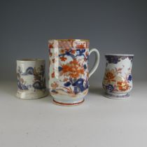A 19thC Chinese porcelain imari palette baluster Mug, decorated in florals, H 16.5cm, together