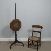 A 19th century mahogany Pole Screen, with octagonal embroidered panel raised on tripod base, H 132