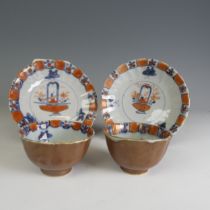 An 18thC Chinese cafe-au-lait porcelain Tea Bowl and Saucer, c. 1750, decorated to the well with