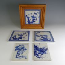 A matched set of three antique Chinese porcelain blue and white Tiles, each depicting exotic birds
