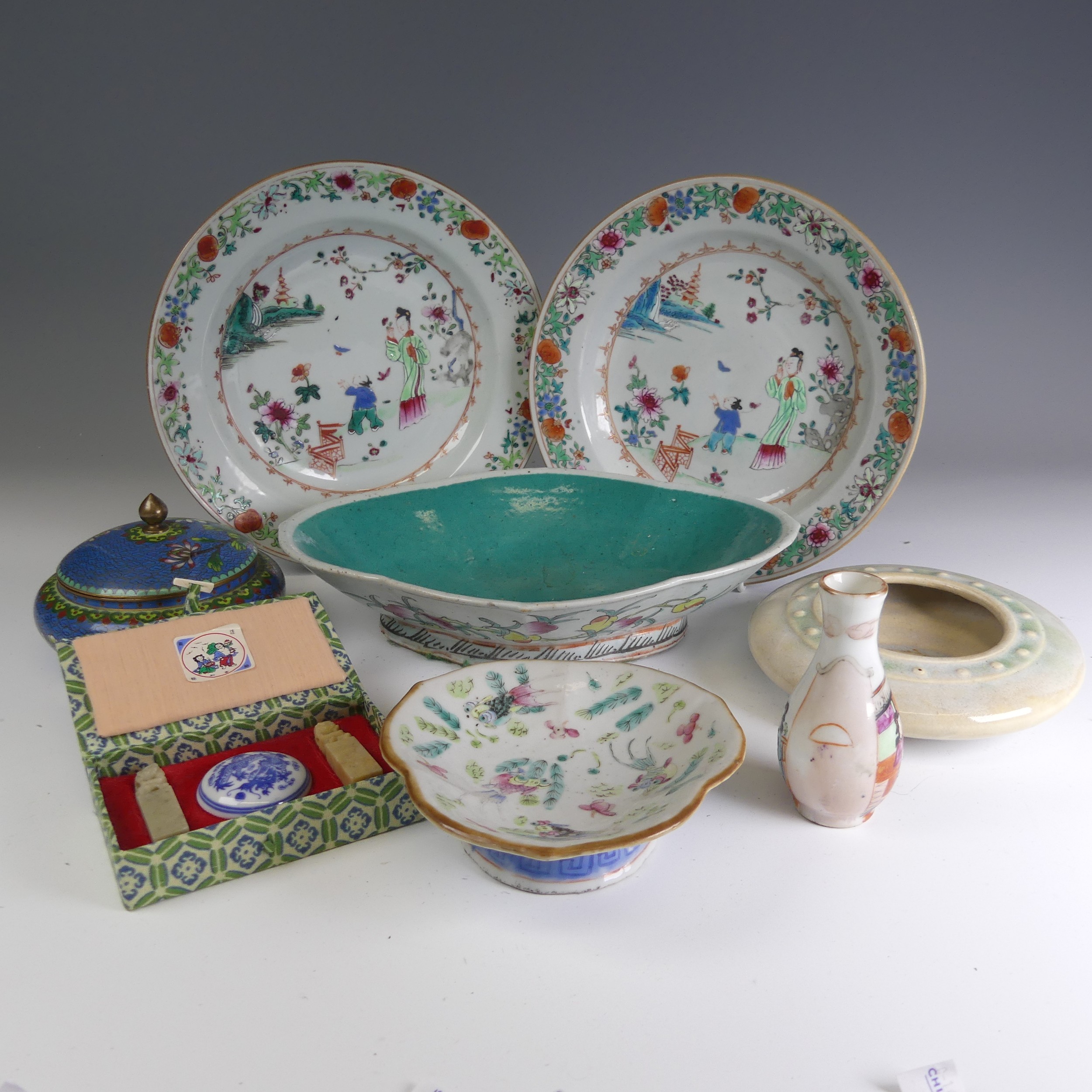 A pair of 19thC Chinese famille rose porcelain Plates, decorated in typical style with colourful