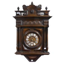 A late 19th century French carved mahogany wall Clock, 8'' mahogany dial with roman numerals on