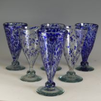 A matched set of six Murano-type blue Glasses, of spotted blue design, of conicular form on knop