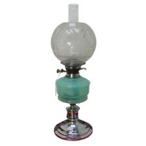 An Art Deco style chrome Oil Lamp, with green glass reservoir and etched glass shade, stamped '