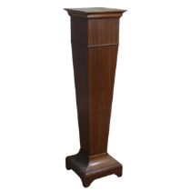 A Victorian style mahogany plant Stand, moulded circular top on turned and canted column, raised