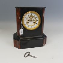 A 19th century French 8-day mantle Clock, in slate case with marble relief, enamel dial with roman