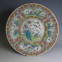 A 19thC Chinese porcelain famille rose Charger, decorated in colourful enamels of flora and fauna