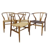 Hans Wegner (Danish 1914-2007) for Carl Hansen & Son ; A set of four 'Wishbone Chairs / Y-Chairs',