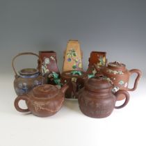 An early 20thC Chinese Yixing pottery Teapot, decorated overglaze in colourful enamels with four