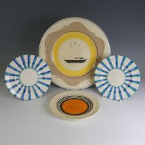 A Susie Cooper Productions Plate, painted with a clipper boat, in within a bright yellow band and