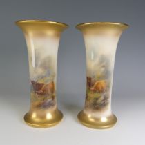 A pair of Harry Stinton for Royal Worcester Highland Cattle Sleeve Vases, with flared rim and base