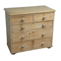 An antique pine Chest of drawers, two short drawers over three long graduating drawers, W 96 cm x