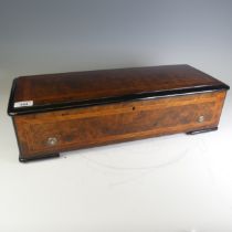 A 19th century burr walnut Swiss cylinder Music Box, playing eight airs on 12 1/2'' brass