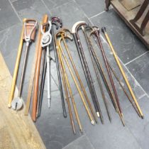 A large quantity of antique and vintage walking Sticks, including, silver mounted, hickory, holly,