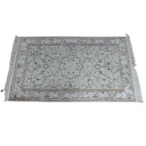 Tribal Rugs; a hand-knotted Persian rug, cotton pile on cotton base, pale green ground, 152cm x