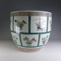 An early 20thC Chinese porcelain Jardiniere, decorated in famille verte palette, with various