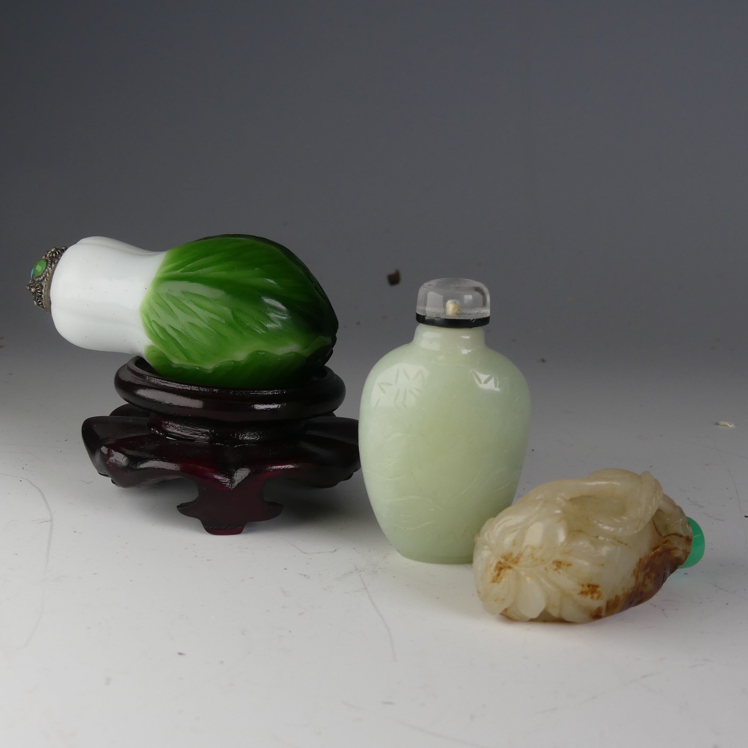 An antique Chinese carved jade Snuff Bottle, in the form of a seed pod, with associated stopper, H