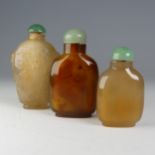 An antique Chinese honey agate Snuff Bottle, well hollowed with jade stopper, H 7.5cm, together with