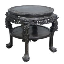 A large Chinese carved hardwood centre / occasional Table, circa 1900, top with smooth flower centre