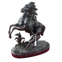 A 19th century bronzed figure of a 'Marley Horse', signed 'Coustou', after Guillaume Coustou, H 41