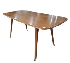 A mid-20th century Ercol blond beech and elm refectory dining Table, circa 1960 model '755',