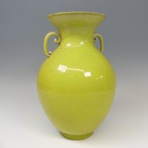 An unusual 19thC Chinese monochrome twin-handled Vase, of lime green colour, baluster form, some