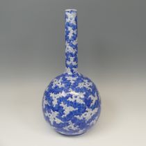 A large Chinese blue and white prunus Bottle Vase, the globular body with slim tapering neck,