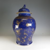 A large antique Chinese porcelain powder blue Temple Jar, in the Kangxi style, decorated in