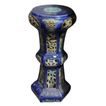 A 20thC Chinese pottery Jardiniere Stand, with pierced apertures, decorated in blues and oranges,