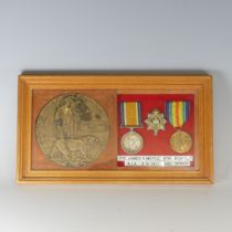 A WW1 Devonshire memorial Plaque 'Death Penny', awarded to the family of 'James Arthur Moyle' K.I.A.
