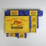 "Matchbox" Garage - Showroom & Service Station, yellow and red, boxed, together with seven Accessory