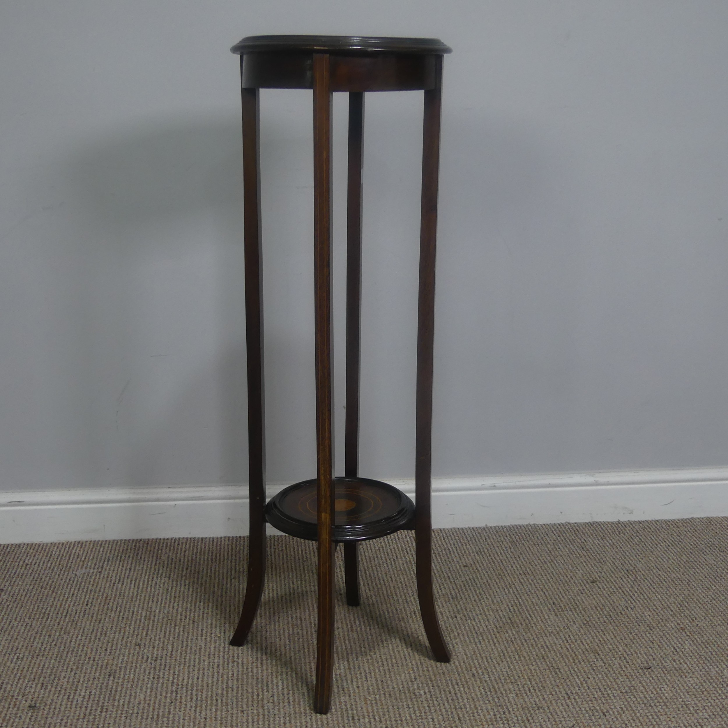 An Edwardian mahogany and inlaid Plant Stand, of circular form, H 99 cm, together with a woven