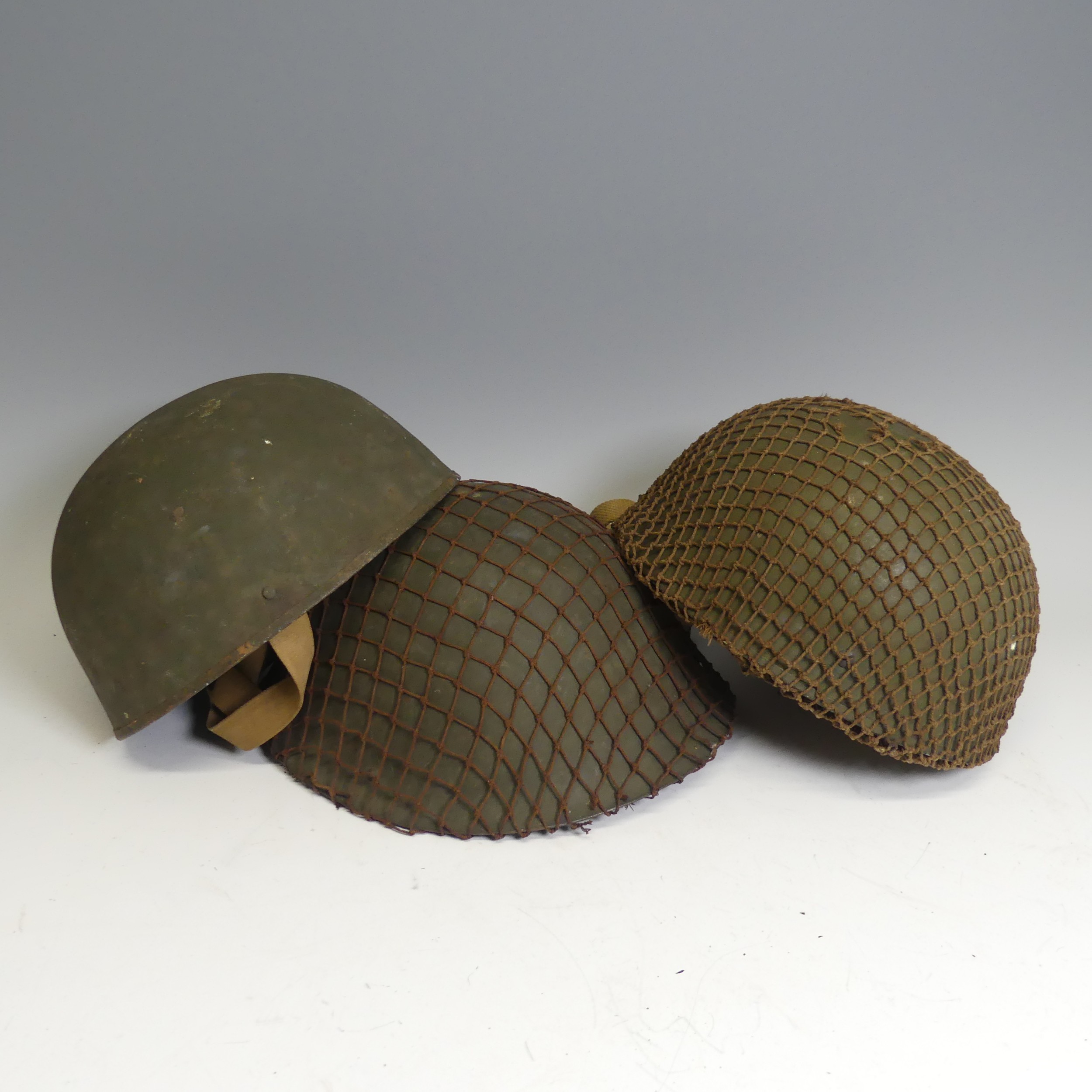 A group of six WW2 period and later military Helmets, including ;  A US 1970s helmet headband - Image 2 of 13