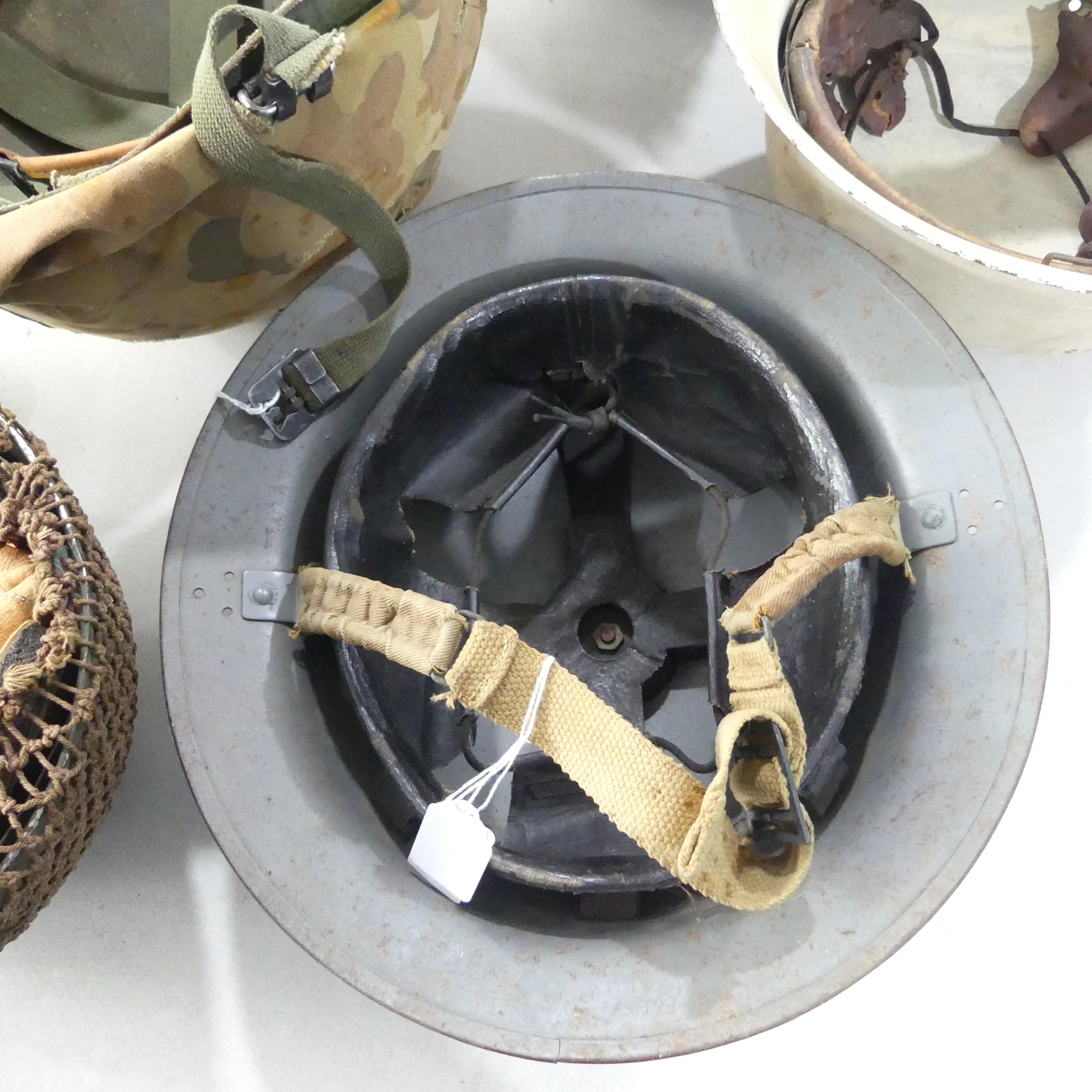 A group of six WW2 period and later military Helmets, including ;  A US 1970s helmet headband - Image 13 of 13